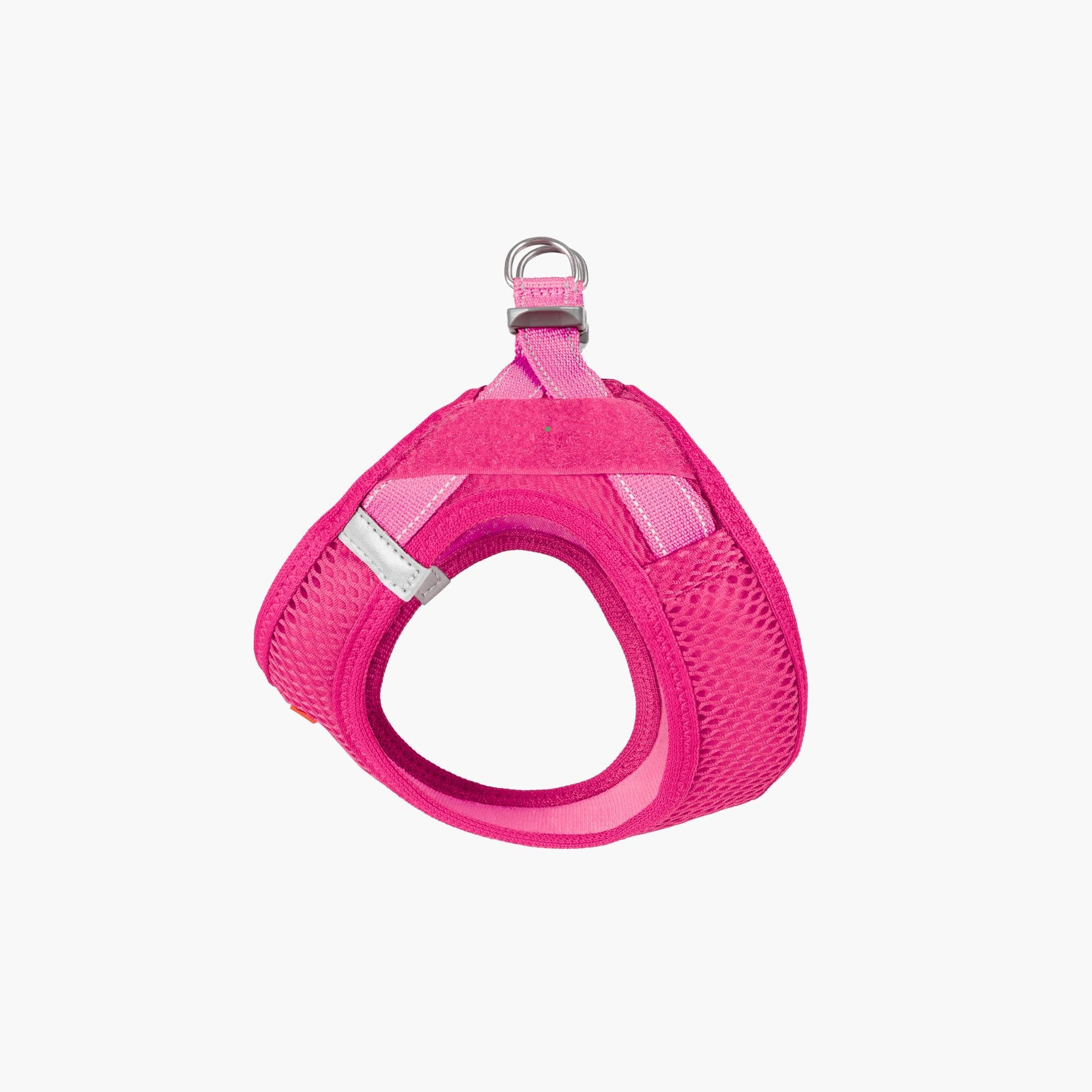 Front view of a pink EzyDog harness with adjustable straps and a metal ring for leash attachment.