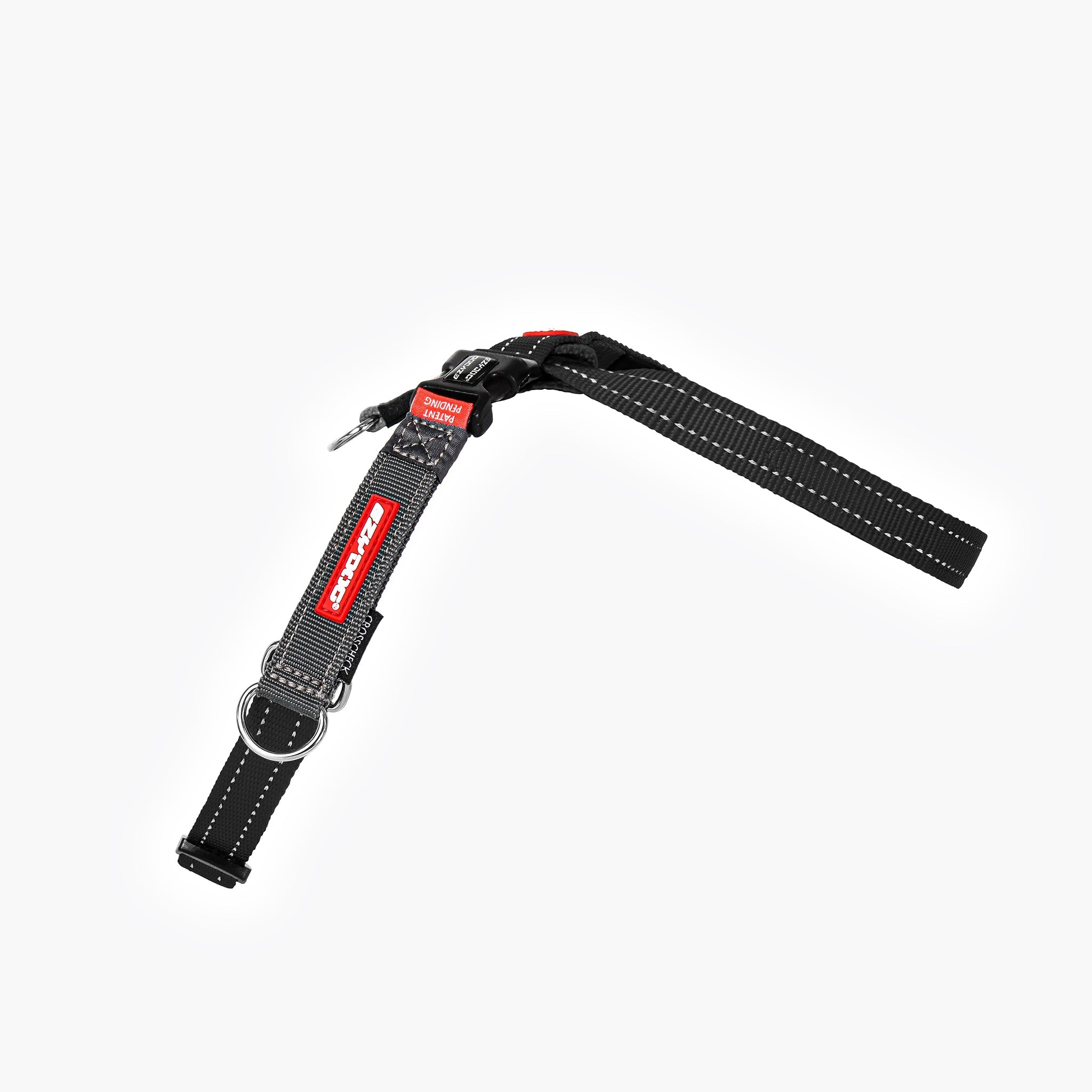 RHS view of EzyDog CrossCheck harness attachment with a metal ring and adjustable strap for secure leash connection.